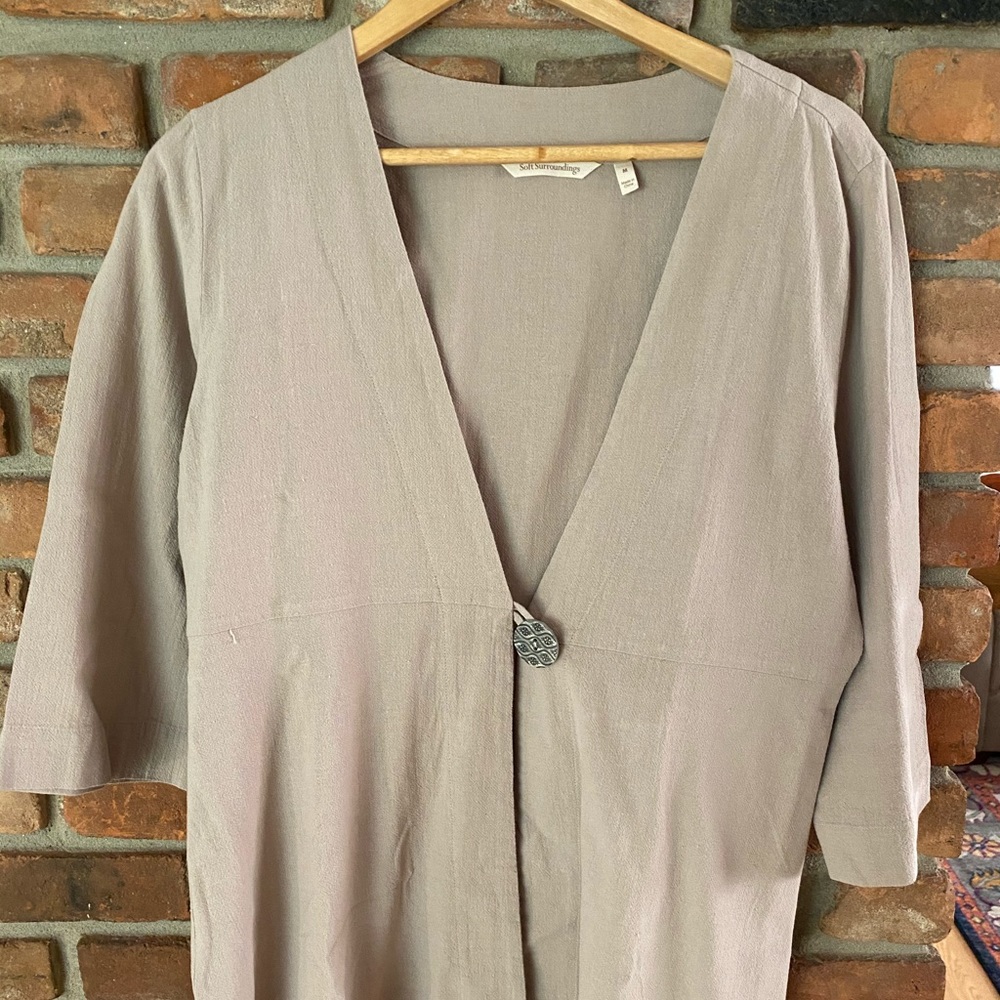 Tan/taupe jacket with embellished button